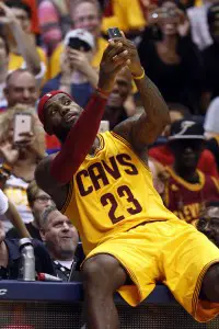 PICS: LeBron Takes A Break & Takes A Selfie With Fans During Preseason Game